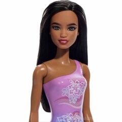 Barbie Plajda Bebekleri -Siyahi Mor Çiçekli Mayolu-  DWJ99